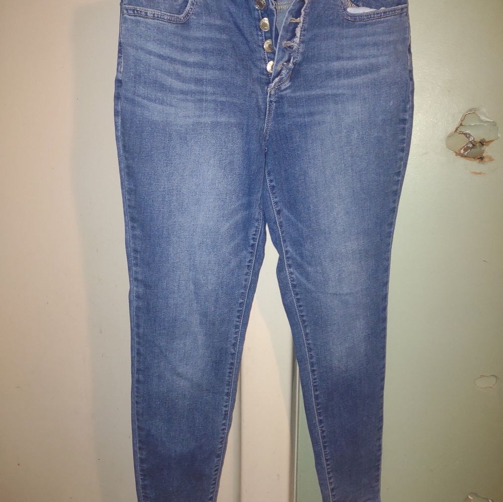 Woman's size medium Maurices skinny high rise‎ button fly jean